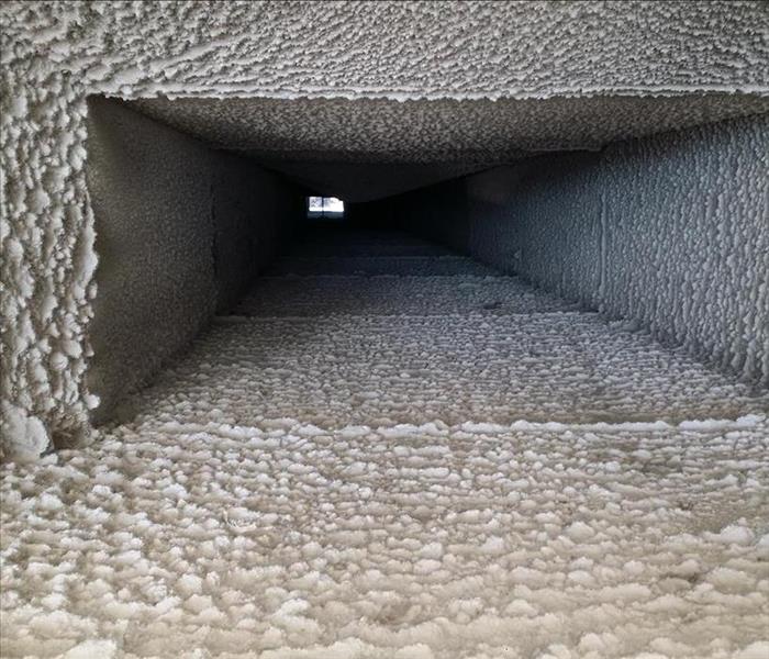 Dirt and dust-covered insides of an air duct
