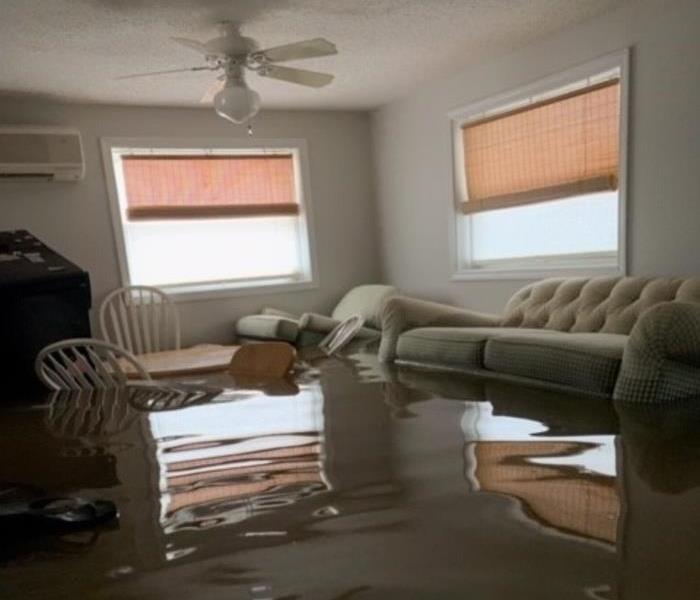 Living room submerged by flood waters