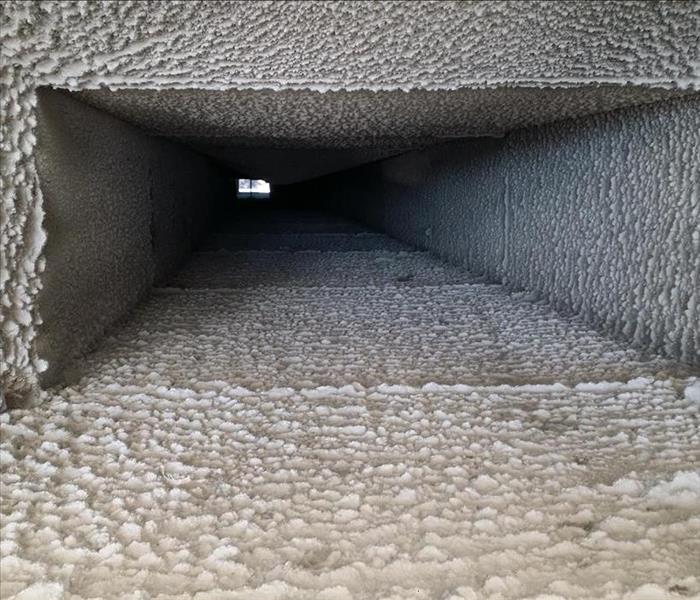 Dirt and dust covering the interior of an air duct